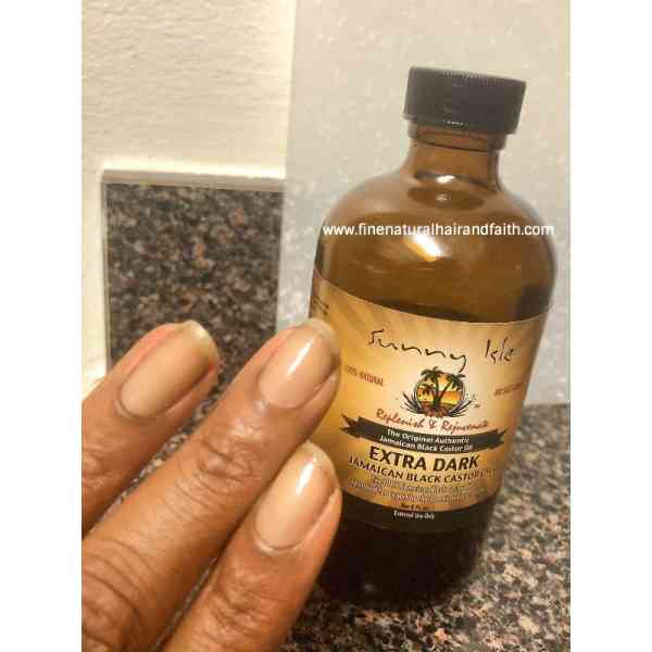 rozino jamaican black castor oil hair skin and nail